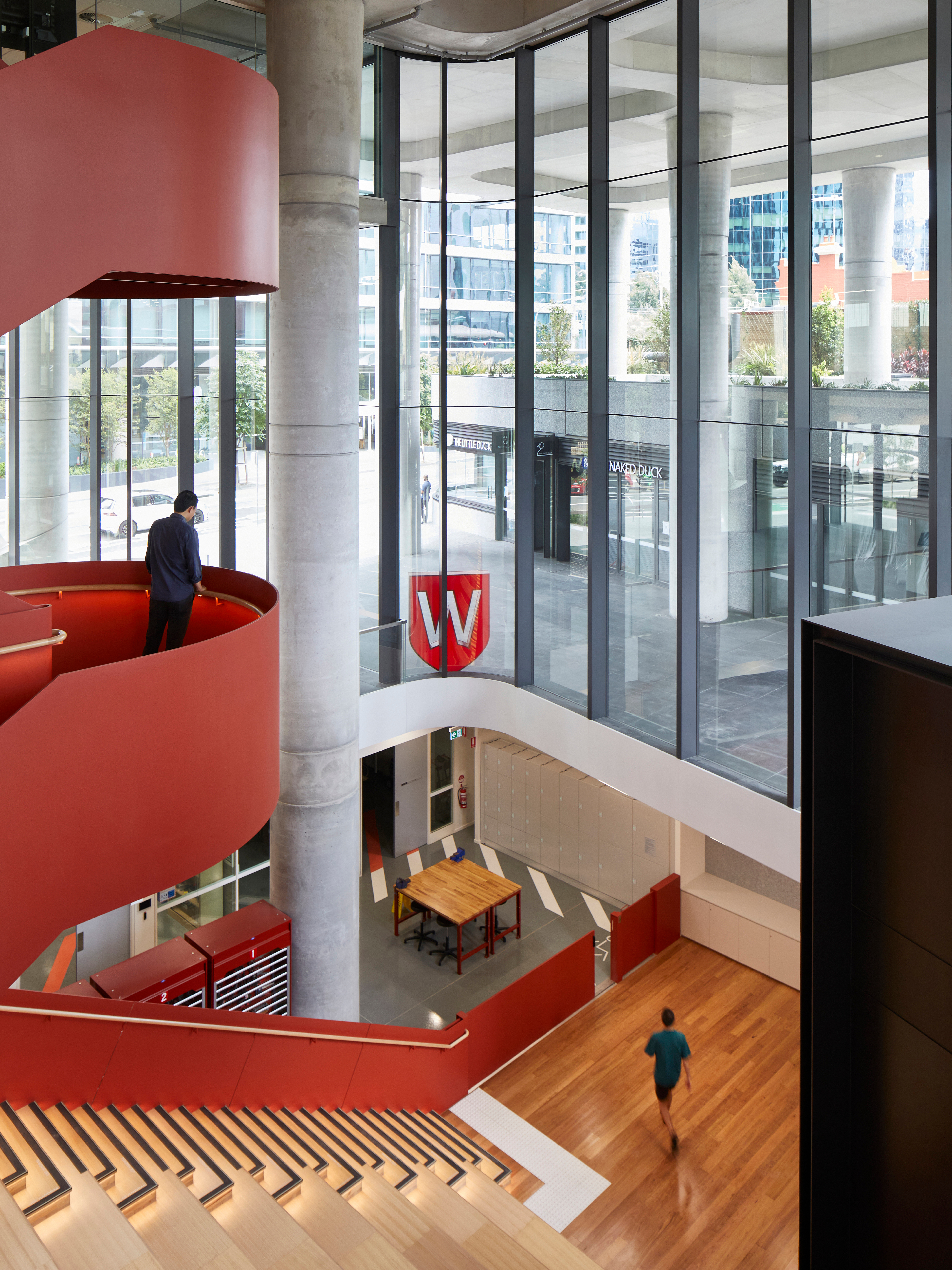 Photograph showing the red central staircase of 6 Hassall Street
