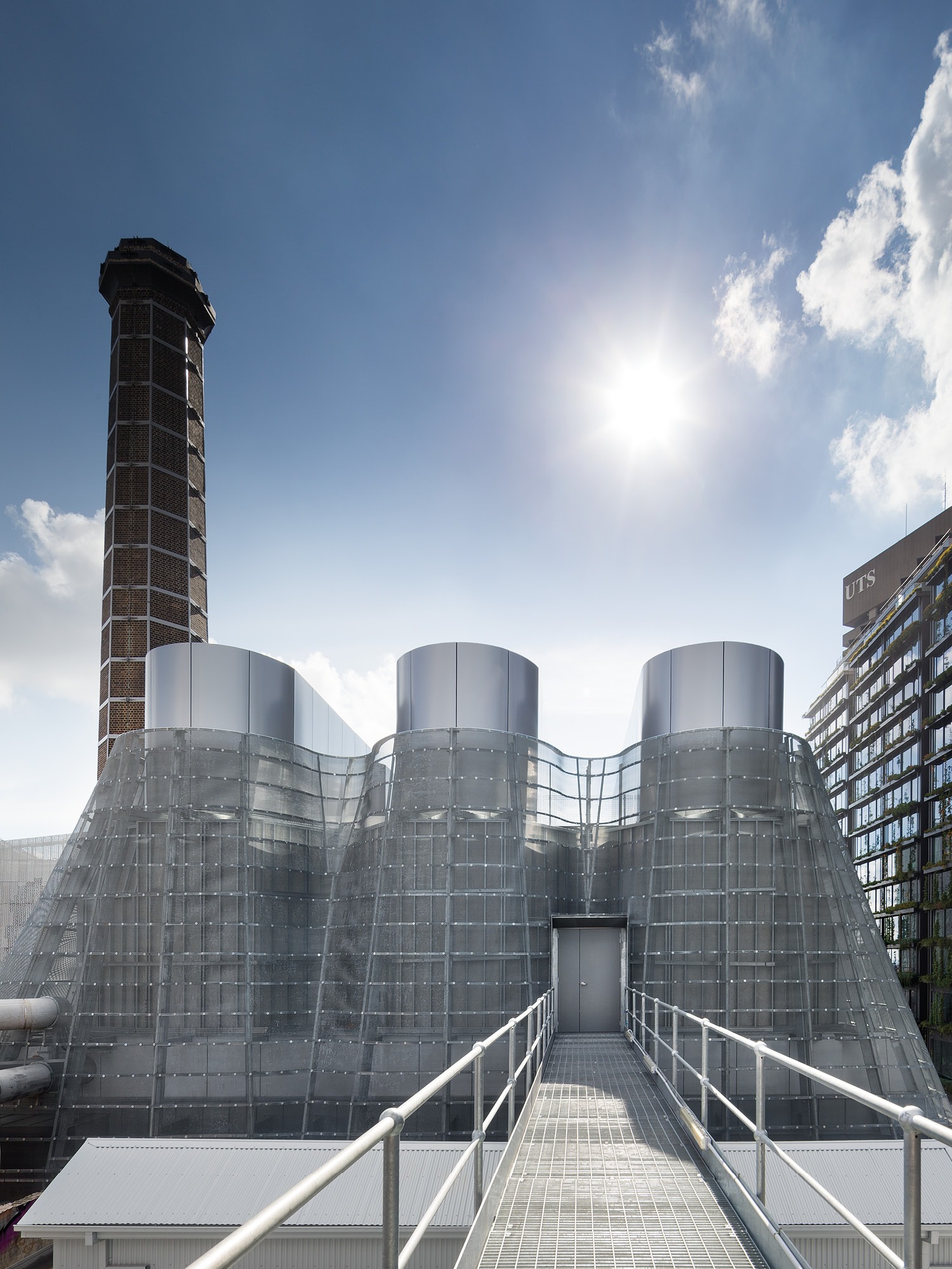 Photograph of the bridge leading to the expressive roof enclosure of the trigeneration plant designed by Tzannes for the Brewery Yard