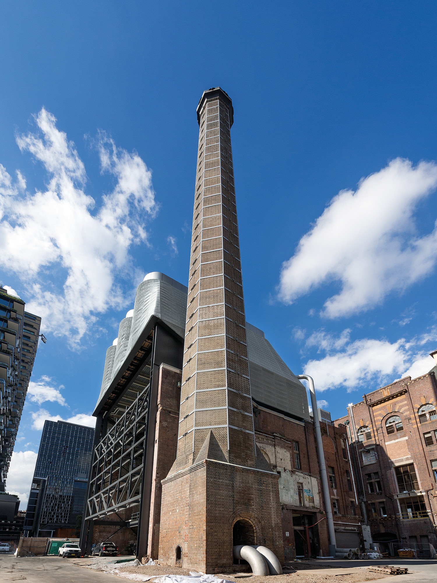 Photograph showing the expressive roof enclosure of the trigeneration plant on top of the heritage structure at Brewery Yard designed by Tzannes