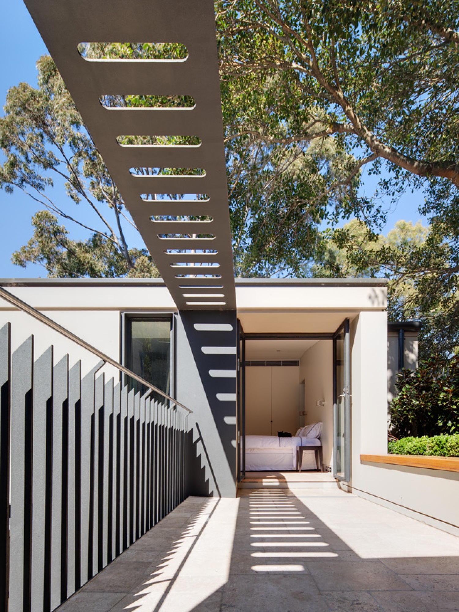 Photograph of balcony leading to bedroom in the Paddington Corner House designed by Tzannes
