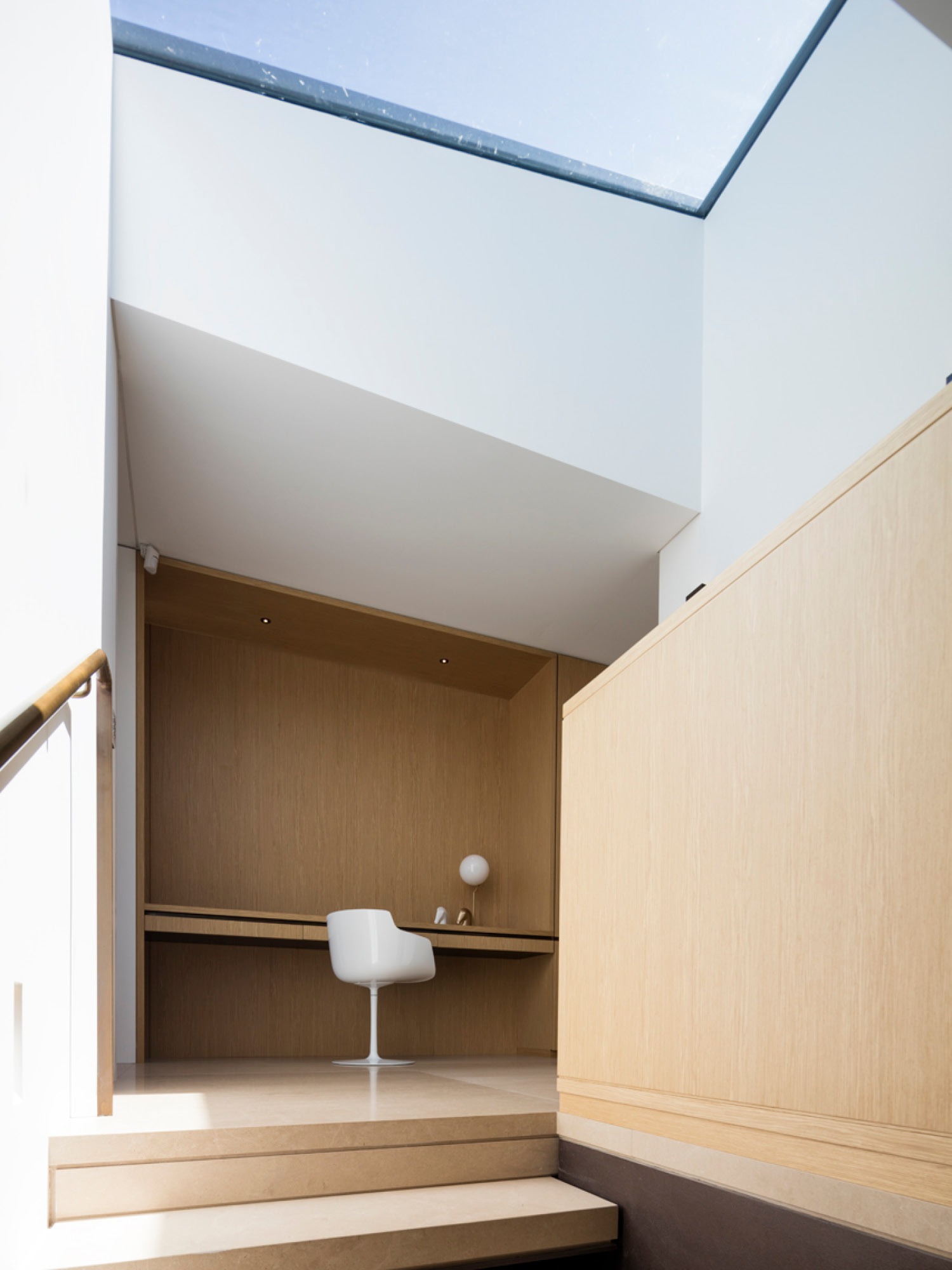 Photograph of internal study space with skylight above in Point Piper Residence designed by Tzannes