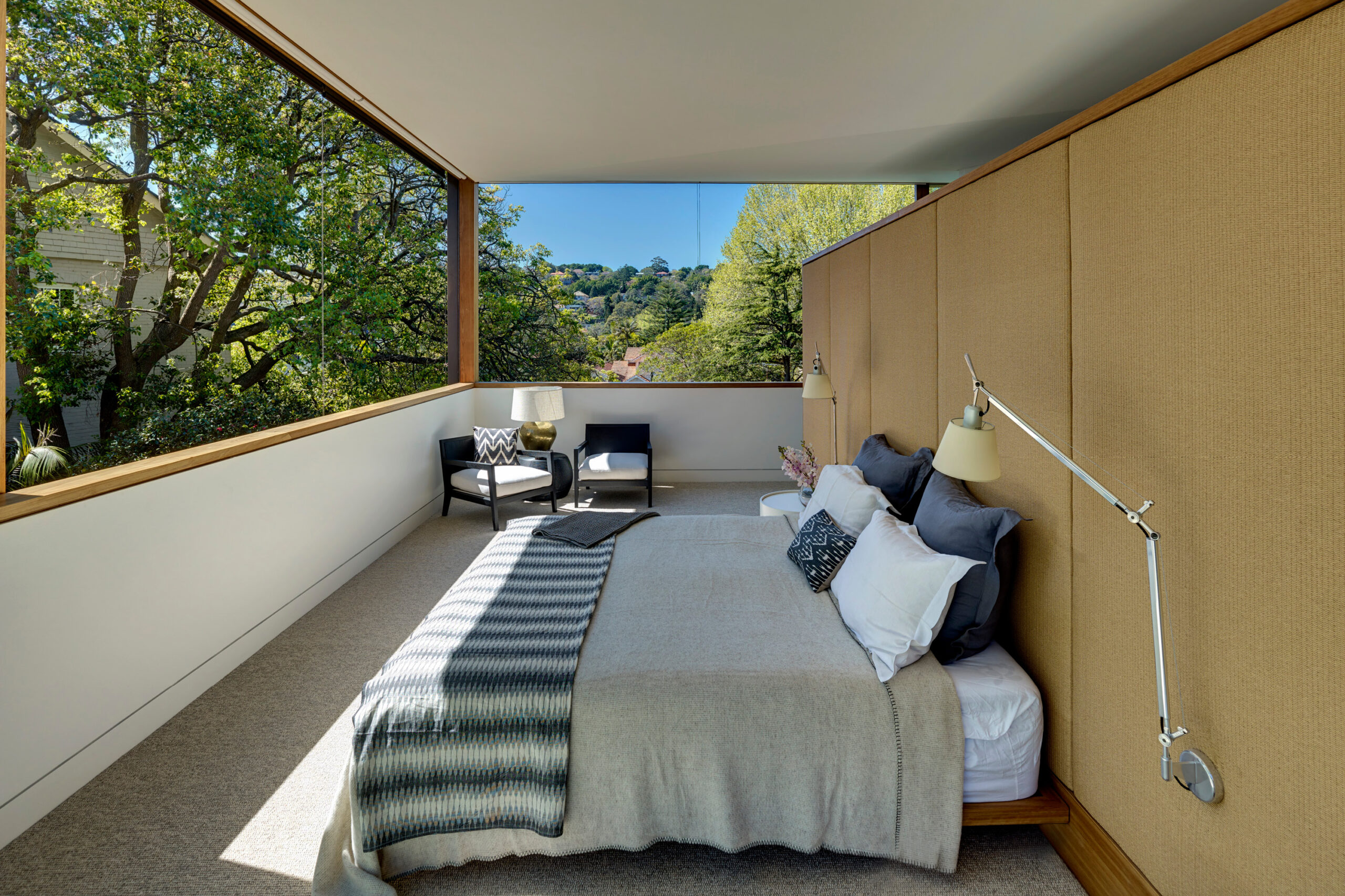 Photograph of upper level bedroom in the Garden House designed by Tzannes