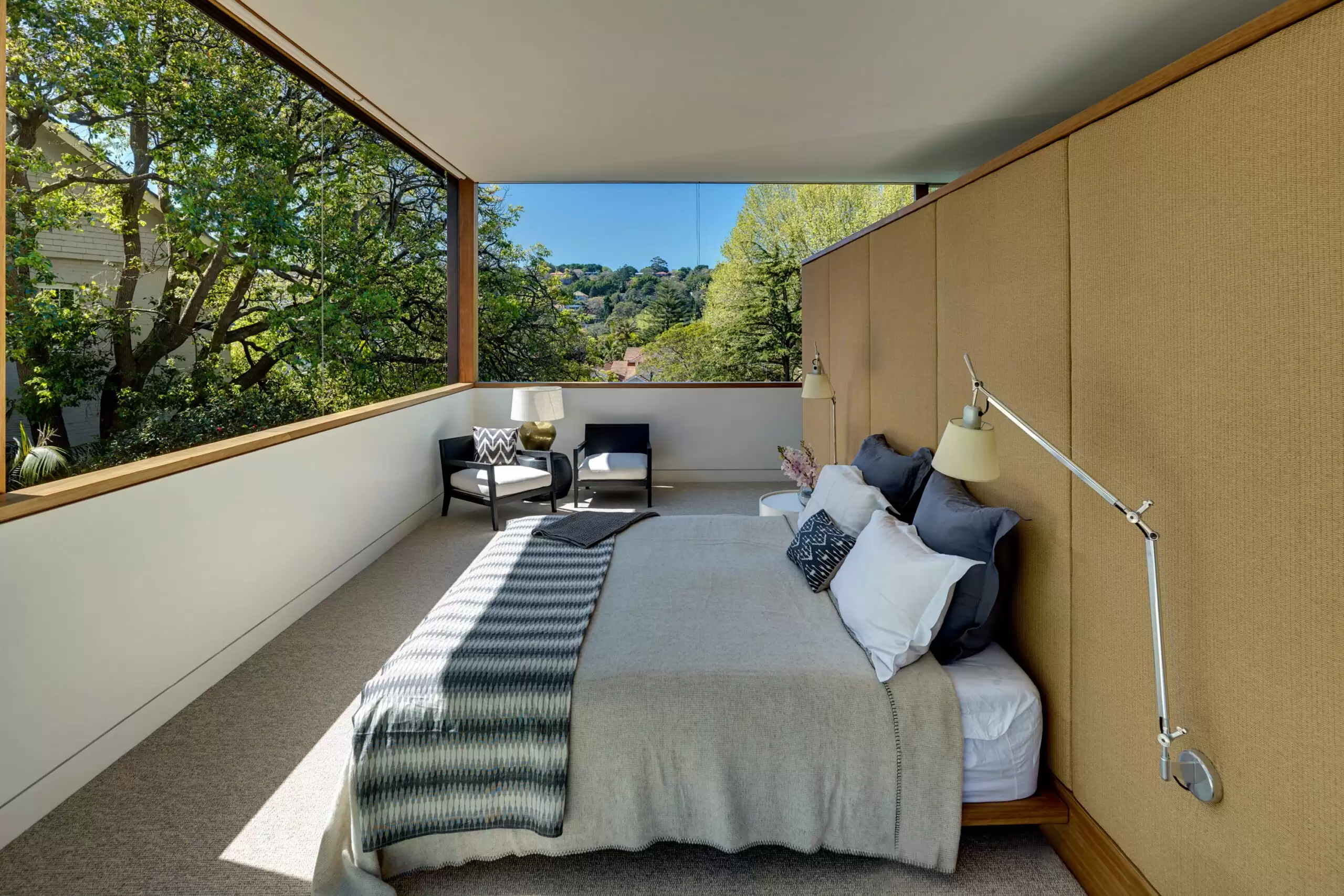 Photograph of upper level bedroom in the Garden House designed by Tzannes