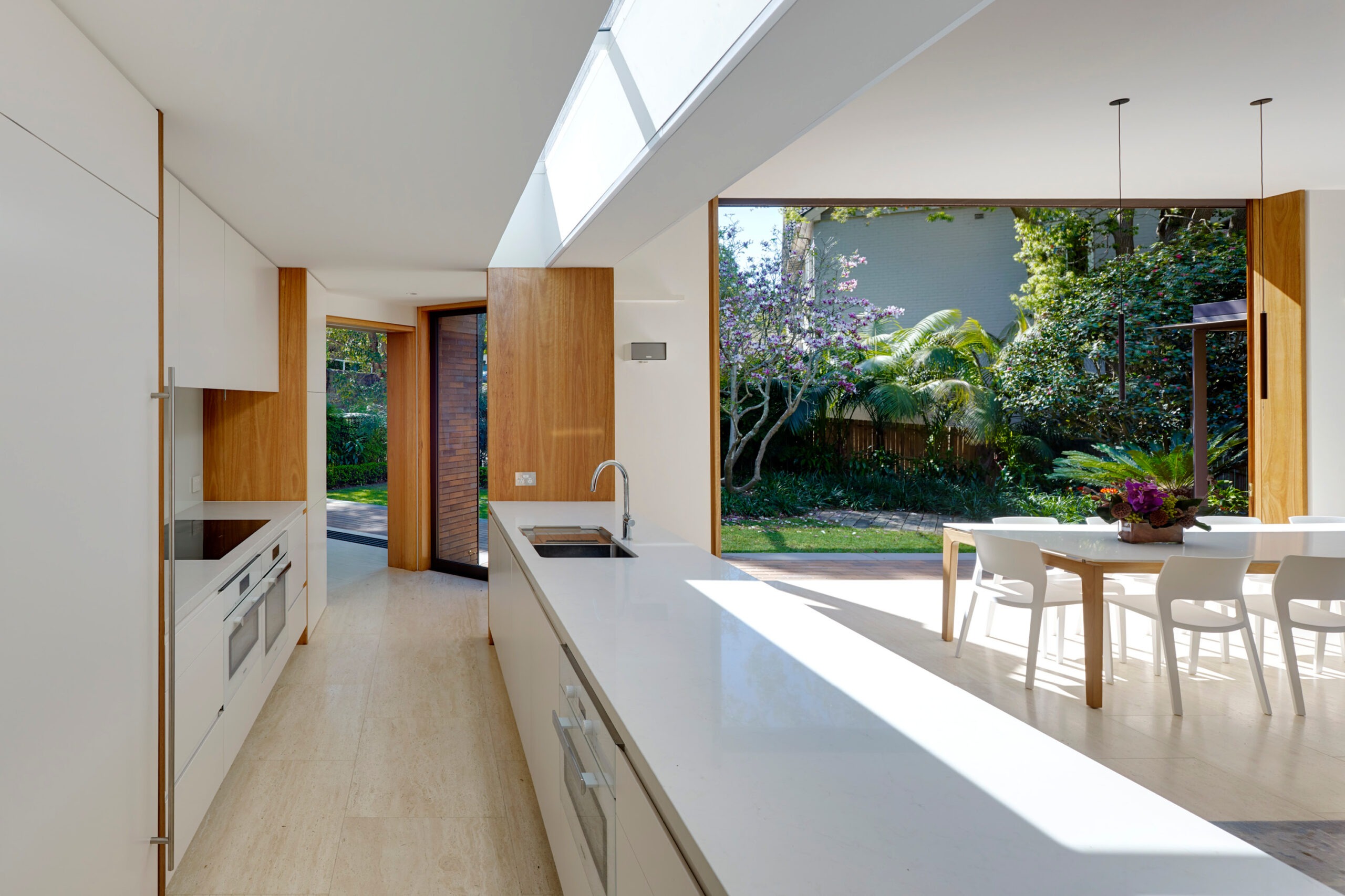 Photograph of the kitchen and dining space in the Garden House designed by Tzannes