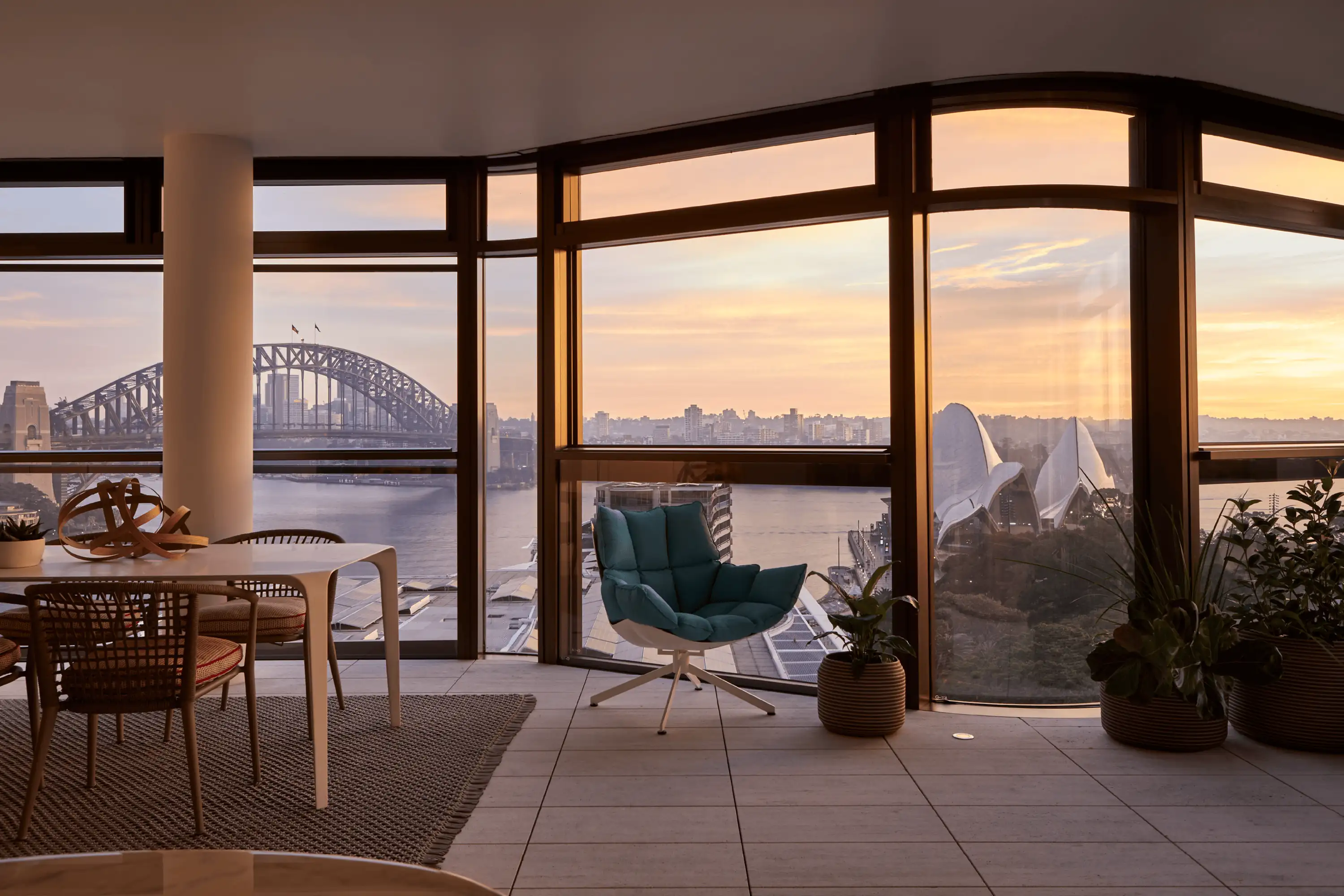 Photograph of apartment view to the Sydney Harbor Bridge and the Sydney Opera House from Opera Residence designed by Tzannes