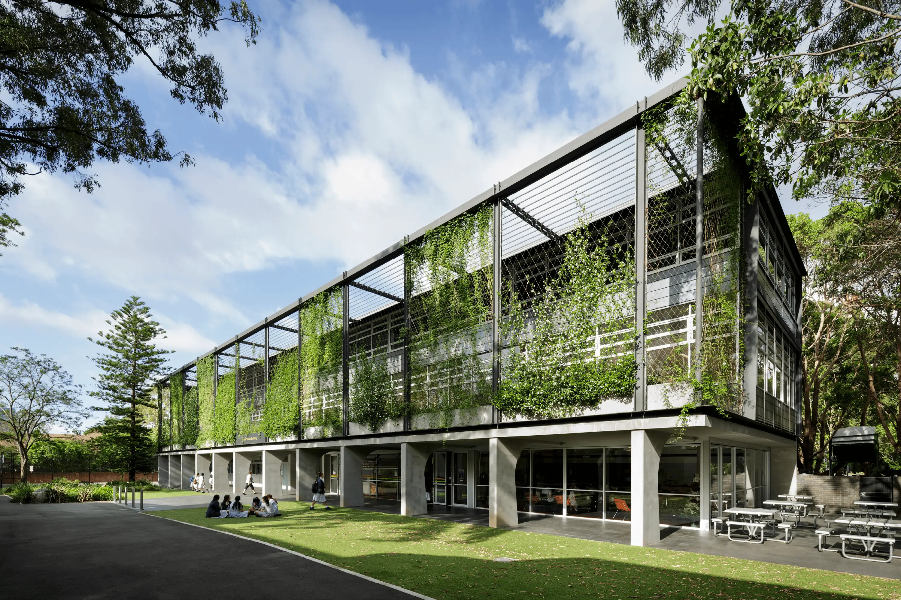 Photograph of exteriors of the award-wining OLMC Janet Woods Building designed by Tzannes