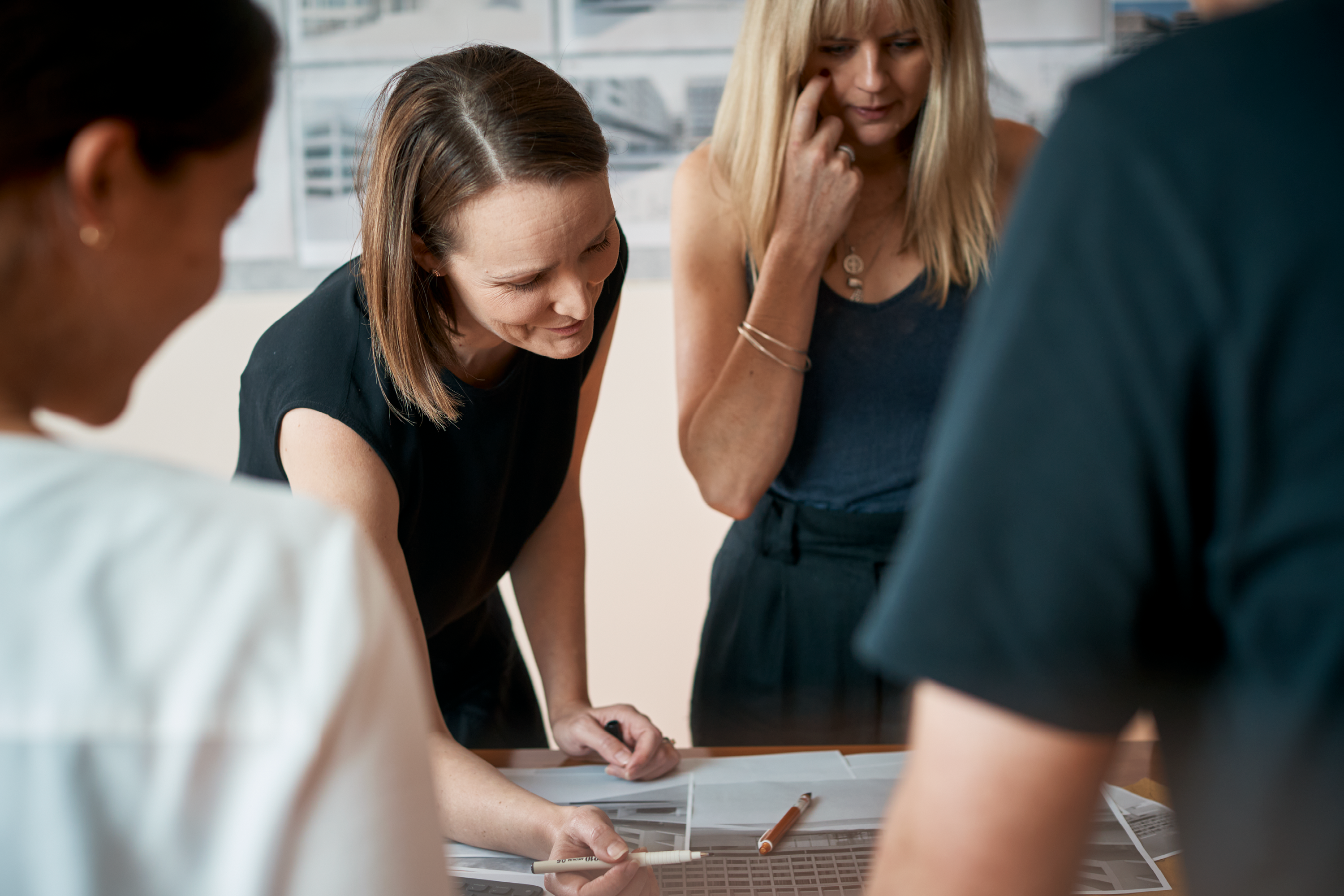 Photograph of Tzannes team in design discussion